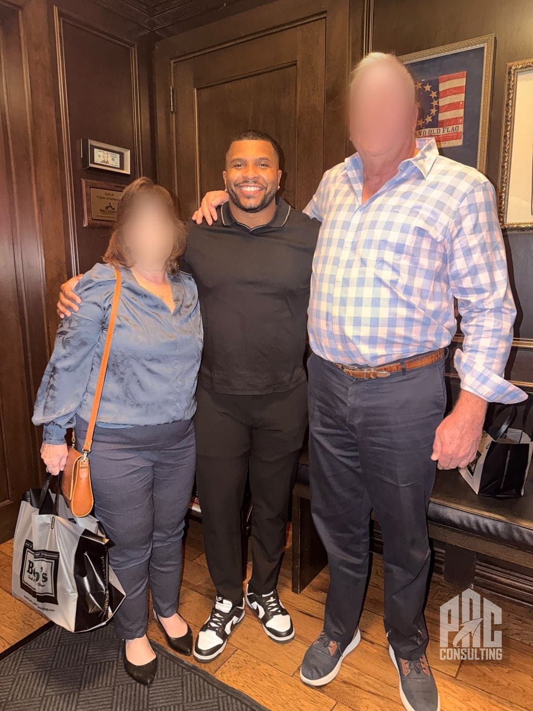 Phillip Crawford with two business owners he has worked with, their faces blurred for confidentiality